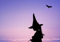 girl with witch costume on Halloween